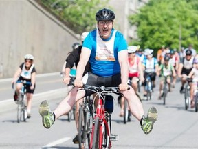 Cyclists participate in the annual Tour de l'Ile in Montreal, Sunday, June 1, 2014.