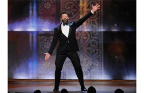 Host Hugh Jackman performs on stage at the 68th annual Tony Awards at Radio City Music Hall on Sunday, June 8, 2014, in New York. (Photo by Evan Agostini/Invision/AP)