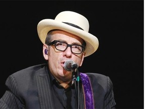 Singer/songwriter Elvis Costello gives a look reminiscent of an earlier time in his career, he released his first album in 1977, during his solo show at the Maison symphonique de Montreal as part of the Montreal International Jazz Festival in Montreal, on Sunday, June 29, 2014.