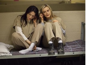 Laura Prepon, left, and Taylor Schilling in Netflix's Orange is the New Black.