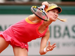 Eugenie Bouchard of Westmount serves during her women’s singles match against Angelique Kerber of Germany on day eight of the French Open at Roland Garros on June 1, 2014 in Paris, France.