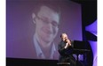 Former NSA contractor Edward Snowden participates in a conversation via video with John Perry Barlow, co-founder & vice chairman of the Electronic Frontier Foundation, at the 2014 Personal Democracy Forum, at New York University, Thursday, June 5, 2014 in New York. (AP Photo/Richard Drew) ORG XMIT: NYRD101