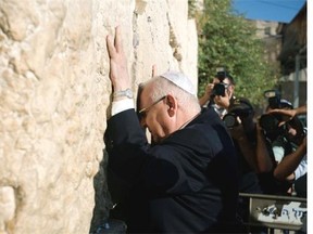 Israel’s newly elected President and former minister and Knesset speaker Reuven Rivlin visits the Western Wall in the Jerusalem’s Old City on June 10, 2014. Israel’s parliament elected Reuven Rivlin, a far-right member of the ruling Likud party, to be the nation’s 10th president when Shimon Peres steps down next month.