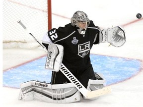 Jonathan Quick #32 of the Los Angeles Kings makes a save against the New York Rangers in overtime during Game Two of the 2014 NHL Stanley Cup Final at the Staples Center on June 7, 2014 in Los Angeles, California.