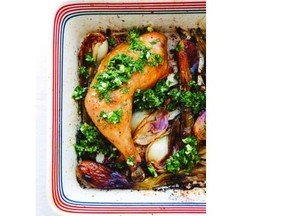 Spring onions and parsley give colour to roast chicken.