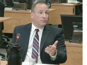 Michel Binette, the former political aide to Nathalie Normandeau, responds to questioning by Charbonneau Commission prosecutor Paul Crépeau on Wednesday June 4, 2014 in Montreal.