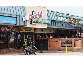 The Rack n' Roll at Forest Glade Plaza is where police allege the sale of one smuggled gun took place in April 2013. The transaction was between three men later charged who have no connection to the bar.