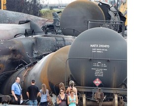 Family members of the victims of the train explosion were allowed to visit the site of the crash in Lac-Mégantic, about 100 kilometres east of Sherbrooke Thursday July 18, 2013, where a train carrying crude oil exploded after derailing.