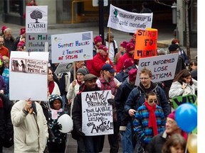 Demonstrators march along de Maisonneuve Blvd. on Oct. 14, 2012, to raise awareness for mental health issues in Canada.