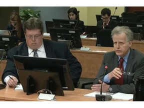 Testifying before the Charbonneau Commission on Friday, May 16, 2014: André Noel, right, former journalist and now investigator for the commission, and Éric Desaulniers, also a commission investigator.