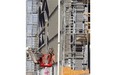 Soccer complex being built near the corner of Papineau Ave. and Louvain St. on Tuesday May 06, 2014. Picture shows worker on the north side of site working on outside wall of main building.