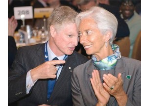 Paul Desmarais Jr., Chairman and co-CEO of Power Corp., chats with Christine Lagarde, Managing Director of the International Monetary Fund at the 20th Conference of Montreal, Monday, June 9, 2014 in Montreal.