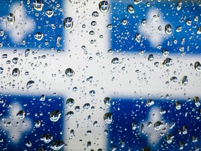 Quebec flag rain