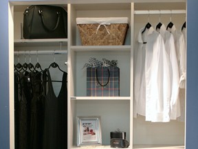 A functional Reach in Closet to maximize your clothing storage with a pull out laundry hamper.