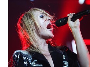 Singer Emily Haines of Metric performs at Bell Centre in Montreal on Wednesday, Nov, 21, 2012. Metric is scheduled to perform at the MRCY block party in Laval on Sept. 12.