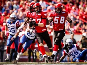 Stampeders’ Simon Charbonneau-Campeau runs the ball during second half CFL action against the Alouettes in Calgary on Saturday.