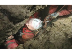 This screenshot from a video provided by the Bavarian Mountain Rescue Service on Tuesday, June 17, 2014 shows rescuers transporting cave explorer Johann Westhauser in Riesending cave near  Marktschellenberg near Berchtesgarden, Germany.