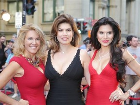 Red hot trio: Hotel Le St. James vice president sales and marketing Elizabeth Glimenaki poses with fellow beauties Tanya Callau (star of  Unusually Thicke) and Real Housewife of Beverly Hills Joyce Giraud de Ohoven at the annual Hotel Le St. James Ferrari F1 Grand Prix Cocktail Event.