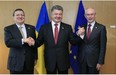 Ukraine’s President, Petro Poroshenko (centre), poses with European Commission President Jose Manuel Barroso (left) and European Council President Herman Van Rompuy at the EU Council in Brussels June 27. Poroshenko said the signing of an association accord with the EU marked a “historic day” that offered his ex-Soviet country a fresh start after years of political instability.