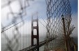 A view of the north tower of the Golden Gate Bridge on June 27, 2014 in Sausalito, California. The Golden Gate Bridge district's board of directors voted unanimously to approve a $76 million funding package to build a net suicide barrier on the iconic span. Over 1,500 people committed suicide by jumping from the iconic bridge since it opened in 1937. 46 people jumped to their death in 2013.