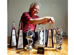 Jim West, owner of Justin Time Records, with some of the Juno’s the company has received over the years.