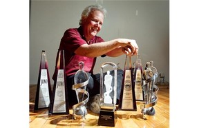 Jim West, owner of Justin Time Records, with some of the Juno’s the company has received over the years.