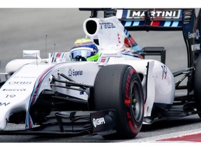 Williams’ Brazilian driver Felipe Massa drives to finish first in the qualifying session of the Austrian Formula One Grand Prix at the Red Bull Ring in Spielberg, Austria on June 21, 2014.