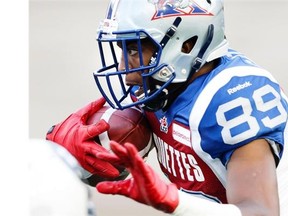 Alouettes wide receiver Duron Carter runs after a catch against the Ottawa Redblacks in a pre-season CFL game at Molson Stadium.