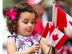 Approximately 40 new citizens received Canadian citizenship at a ceremony in Montreal’s Old Port, on Tuesday, July 1, 2014. Originally from the Ivory Coast, Florent Kouassi and the rest of his family became new Canadians.