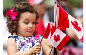 Approximately 40 new citizens received Canadian citizenship at a ceremony in Montreal’s Old Port, on Tuesday, July 1, 2014. Originally from the Ivory Coast, Florent Kouassi and the rest of his family became new Canadians.