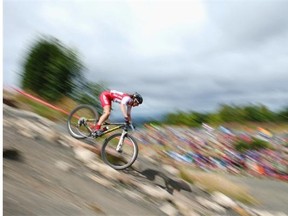 Bethany Crumpton of England rides in the Women's Cross Country Mountain Biking at Cathkin Braes Mountain Bike Trails during day six of the Glasgow 2014 Commonwealth Games on July 29, 2014 in Glasgow, United Kingdom.
