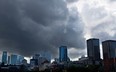 Storm clouds roll in over the skyline of Montreal on Wednesday June 18, 2014.  (Allen McInnis / THE GAZETTE)