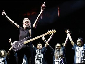 British singer Roger Waters performs during The Wall Live tour at the Stade-de-France stadium in 2013.