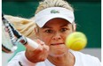 Canada’s Aleksandra Wozniak returns the ball during the first round match of the French Open tennis tournament against Romania’s Sorana Cirstea at the Roland Garros stadium, in Paris, France, Tuesday, May 27, 2014.