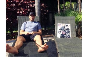 Canadiens defenceman Mike Weaver and a magazine poster of teammate Max Pacioretty are photographed lounging in Florida on June 6, 2014. Weaver has had the poster of Pacioretty, which first was taped up in his Montreal dressing-room area as a gag, with him this summer. He’s had them photographed together here and on an airplane, at poolside, in Weaver’s truck and on a golf course, tweeting every image. And Weaver vows their summer of fun has just begun.