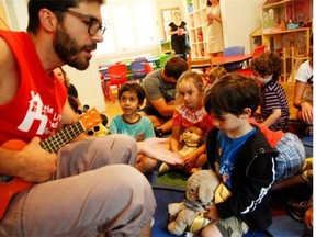 Children at Little Red Playhouse preschool dance and sing songs, in Montreal, Tuesday July 15, 2014.