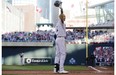 Derek Jeter, of the New York Yankees waves to the crowd during the first inning of the MLB All-Star game, Tuesday, July 15, 2014, in Minneapolis. (AP Photo/Jim Mone)