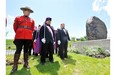 Dignitaries pay their respects to the Irish typhus victims who fled the potato famine in 1847 at the Black Rock in Montreal, Sunday, May 31, 2009.