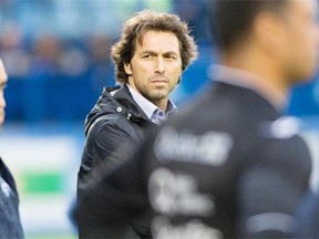 Impact’s Nick De Santis looks back on the bench during the a soccer game against the Puerto Rico Islanders at Saputo Stadium in Montreal, Wednesday, June 29, 2011.