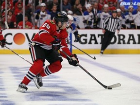 CHICAGO, IL - APRIL 23: Patrick Kane #88 of the Chicago Blackhawks skates up the ice on his way to scoring the game-winning goal against the St. Louis Blues in Game Four of the First Round of the 2014 NHL Stanley Cup Playoffs at the United Center on April 23, 2014  in Chicago, Illinois. The Blackhawks defeated the Blues 4-3 in overtime. (Photo by Jonathan Daniel/Getty Images)