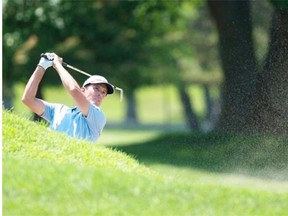 Mike Weir from Canada plays a shot from the bunker during the Pro-Am tournament at the 2014 RBC Canadian Open at the Royal Montreal Golf Club in Montreal, Monday, July 21, 2014.