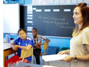 English teacher Eziz Sansone, right, speaks with her class at École Beau-Séjour in St-Laurent on Tuesday, June 10, 2014. Allen McInnis/THE GAZETTE