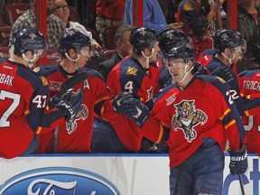 SUNRISE, FL - APRIL 10:  Brad Boyes #24 of the Florida Panthers is congratulated by teammates after scoring a second-period goal against the Toronto Maple Leafs at the BB&T Center on April 10, 2014 in Sunrise, Florida. (Photo by Joel Auerbach/Getty Images)