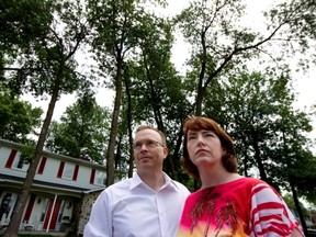 Patrick and Liane Boyle outside their Harwood Gate home in Beaconsfield. The couple are trying to decide what to do about the 17 ash trees that surround their home.