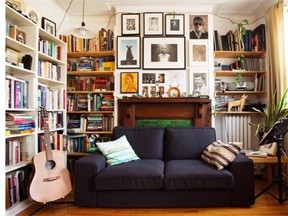 Photos, artworks and books surround the fireplace in Scott MacLeod’s apartment.