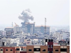 Smoke rises after an Israeli missile strike in Gaza City, Tuesday, July 15, 2014. The Israeli military says it has resumed airstrikes on Gaza after Hamas militants violated a de-escalation brokered by Egypt.