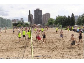 Staff at 29 Montreal bars and restaurants gather for beach volleyball tournament organized by Head & Hands at Jeanne Mance Parc in Montreal on Sunday to raise money for sex education.