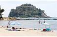 At swim in Mediterranean waters on the French Riviera in front of the French presidential retreat Fort de Bregancon, now open to the public for the first time.