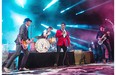 Ty Taylor, centre, of the American rock band Vintage Trouble performs with his group for the 2014 Montreal International Jazz Festival at Place des Arts in Montreal on Tuesday, July 1, 2014.