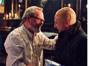 Terry Gilliam in familiar madcap form with Christoph Waltz on the set of Gilliam’s The Zero Theorem. (Courtesy of Fantasia)